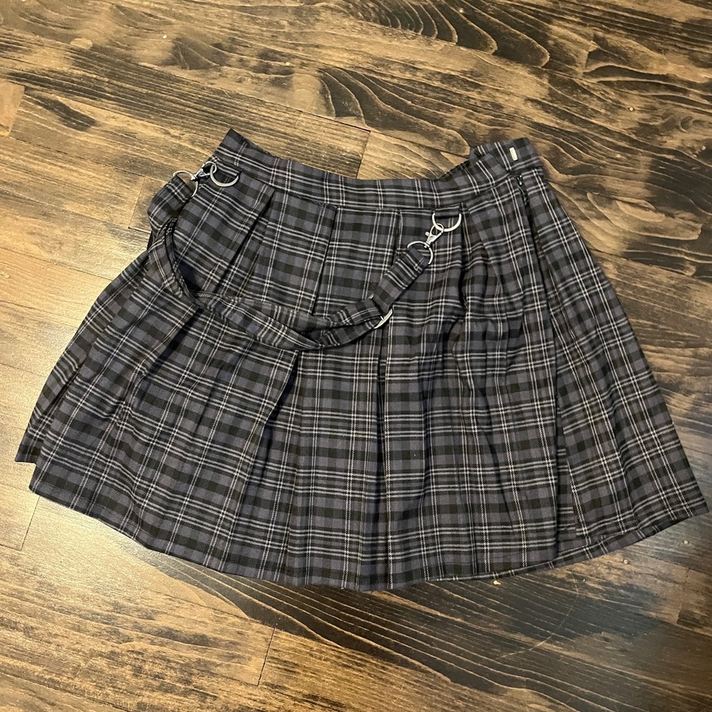 a small black plaid mini skirt from hot topic.